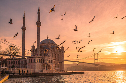 Ortak?y Mosque is located in Be?ikta?, Istanbul, Turkey, is situated at the waterside of the Ortak?y pier square, one of the most popular locations on the Bosphorus. This structure is symbolic of the district of Ortak?y as it has a distinctive view of the Bosphorus Strait of Istanbul and the Bosphorus Bridge here in a view with birds