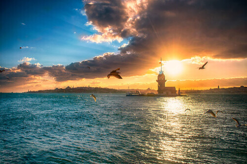 Istanbul Maiden Tower from the east in sunset. In the distance are such landmarks as Blue Mosque, Hagia Sophia and Topkapi Palace